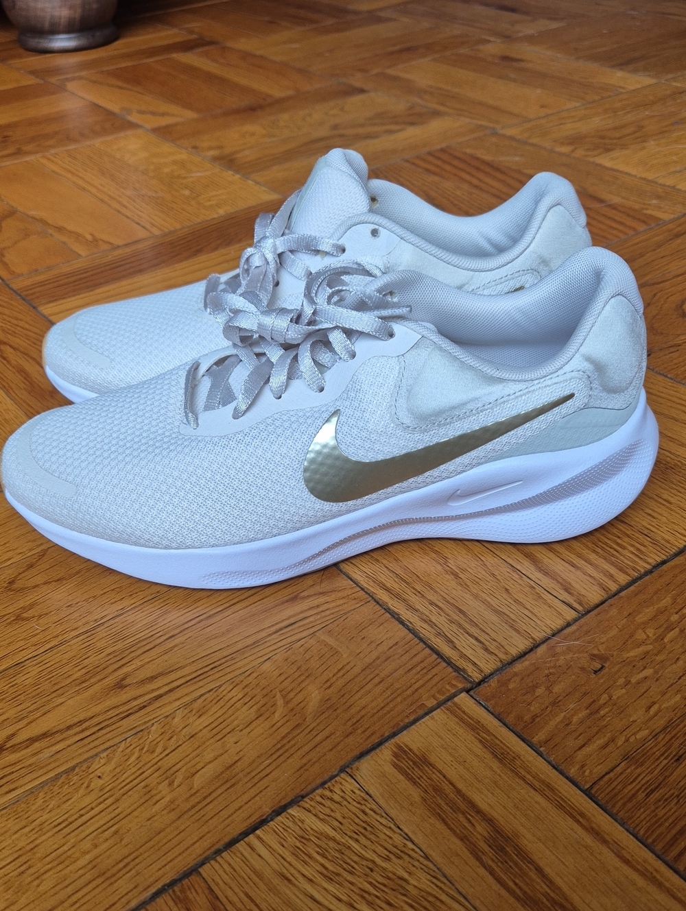 Nike Women's White Mesh Running Shoes with Gold Swoosh